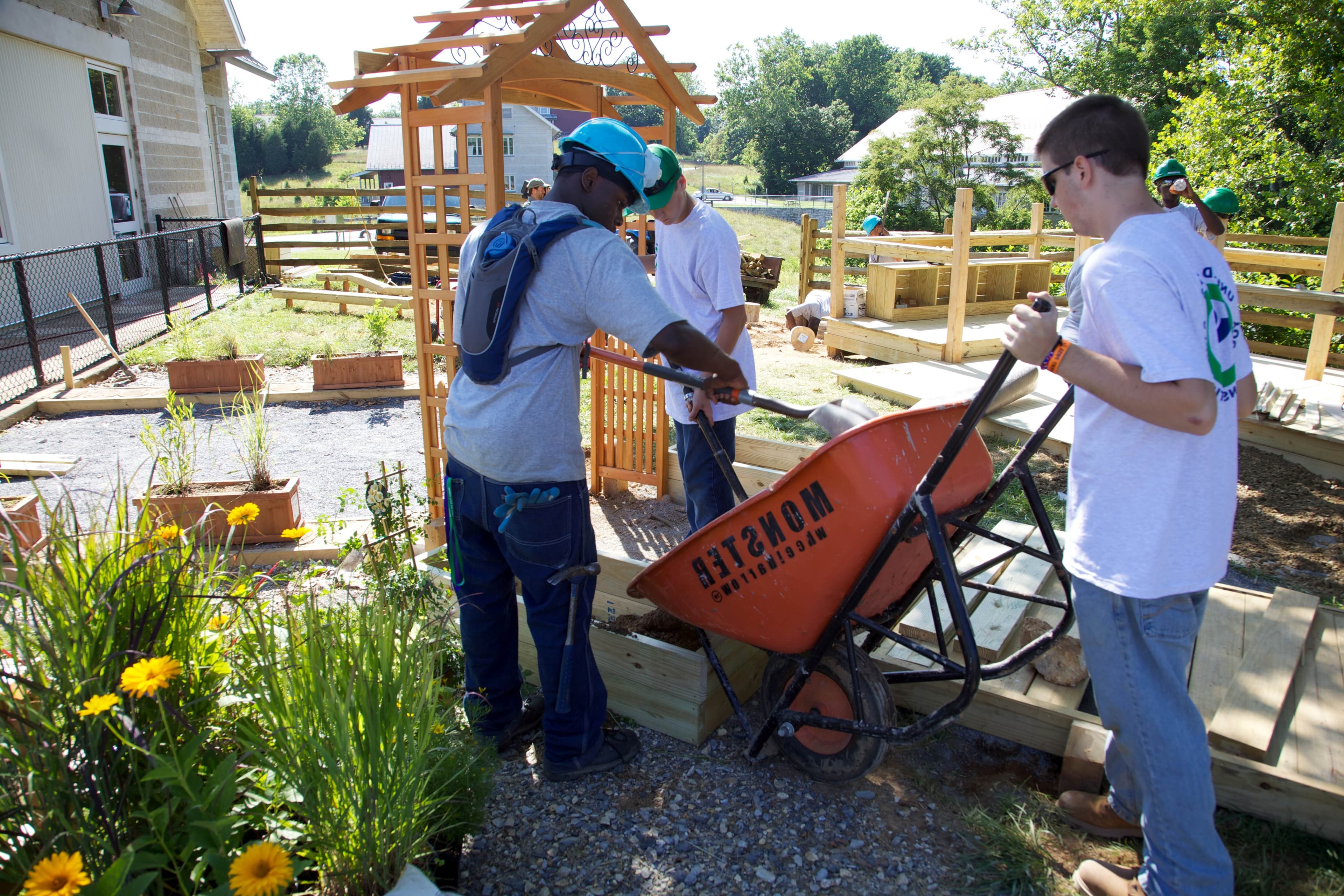 The A.L.B. crew working together on a neighborhood yard